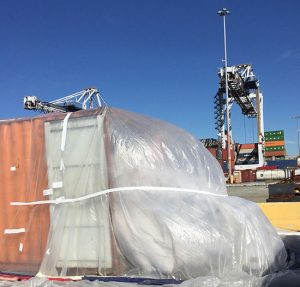 Wrapped container undergoing fumigation