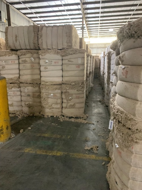 Wrapped bales in warehouse storage