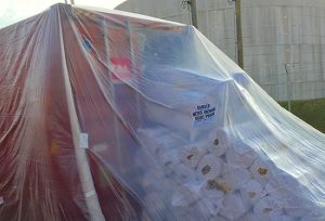 Wrapped shipping container prepared for fumigation